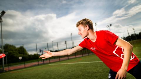 Boy playing outdoor sports